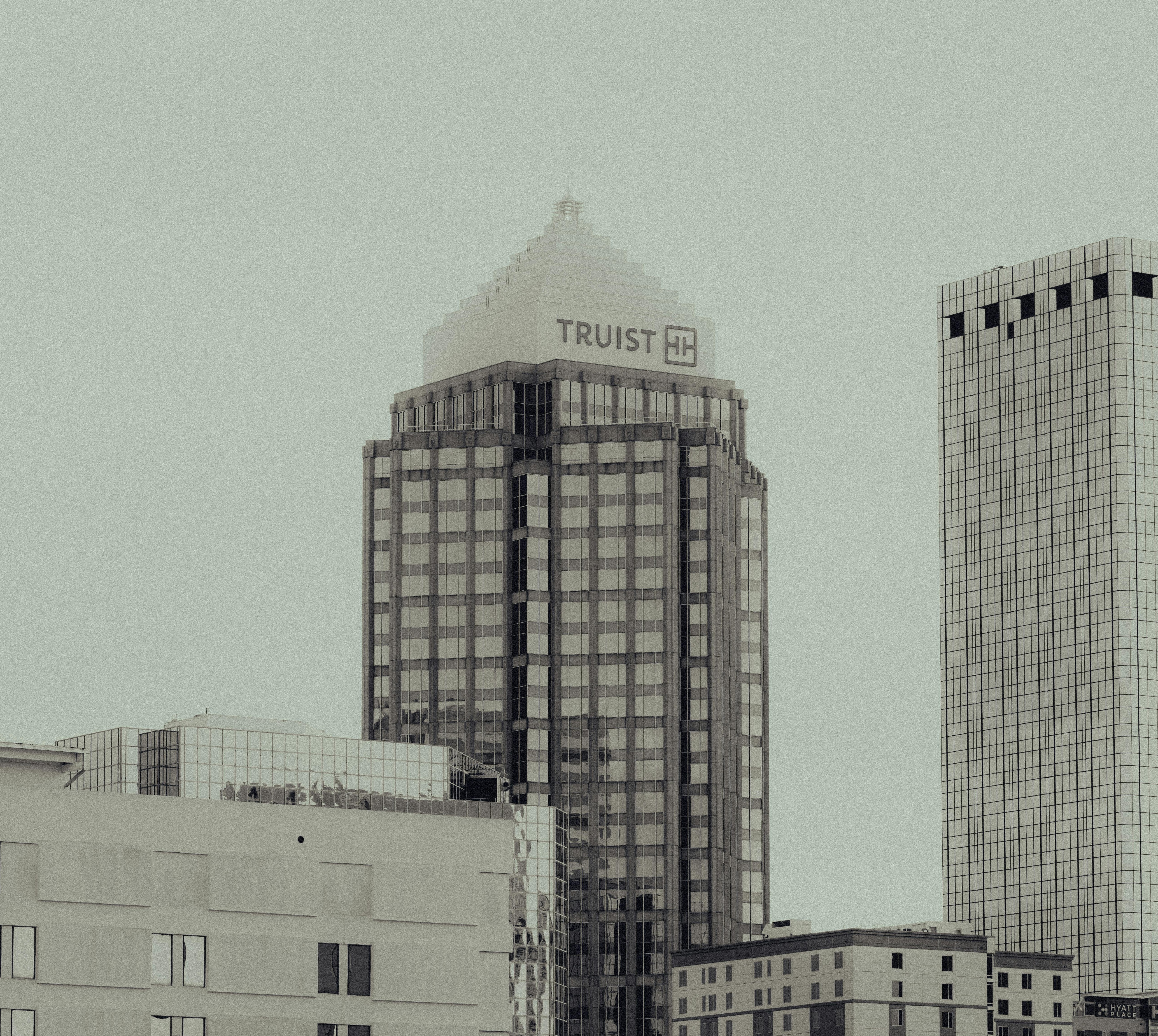 Historic city architecture in black and white.